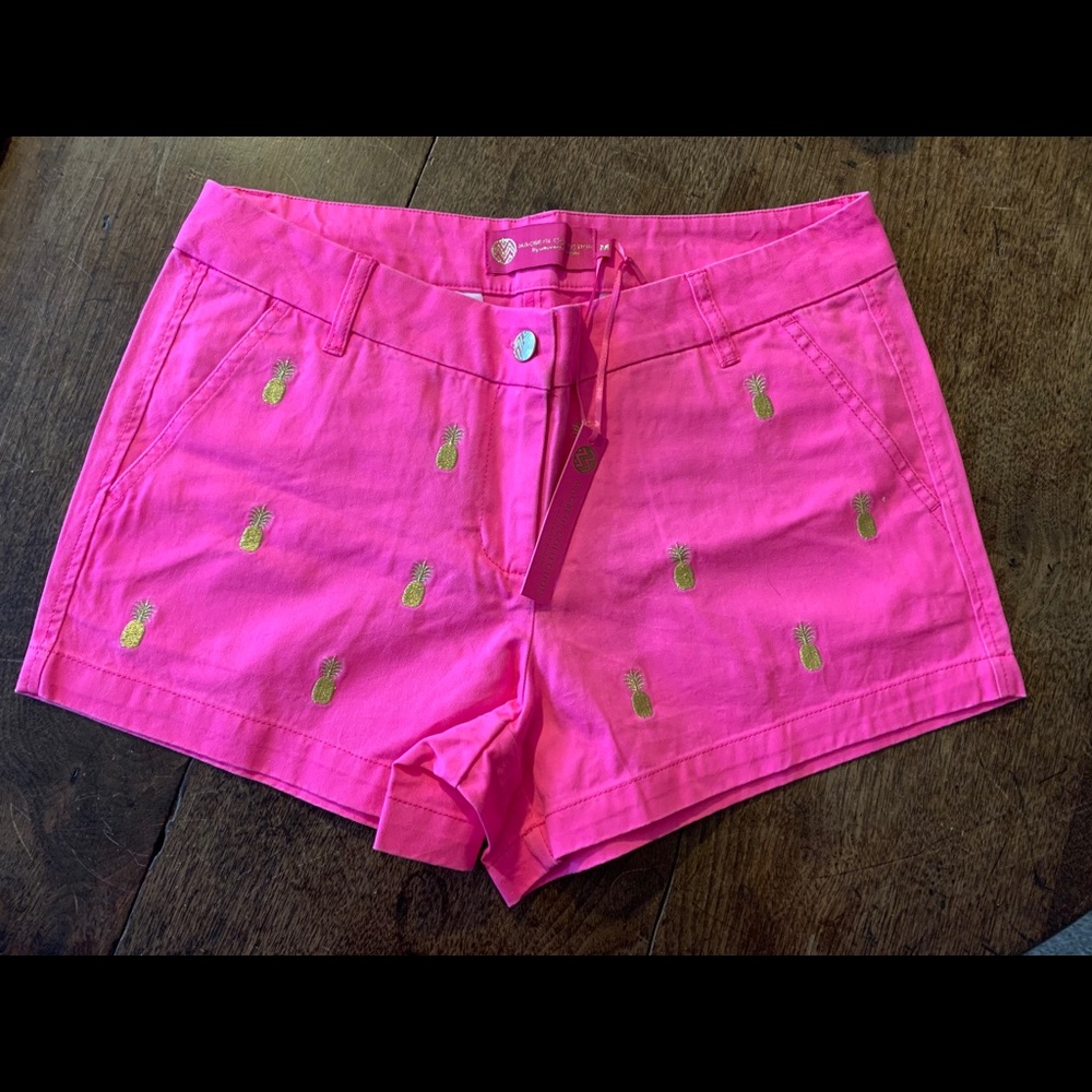 pink shorts with gold pineapples